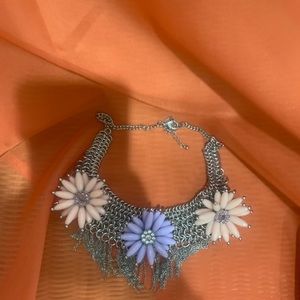 Beautiful silver necklace with blooming flower design